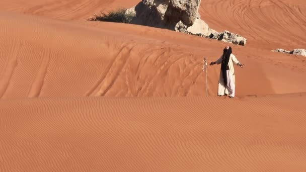 Young Bearded Man Dressed Shaman Dancing Desert Sand Drone Aerial — Stock Video