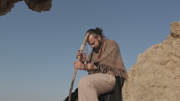 Young Bearded Man Dressed Shaman Staff His Hands Stands Lonely — Stock Video