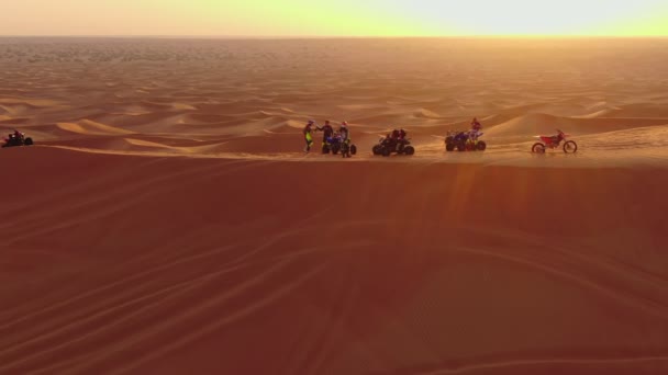 Drone Flies Atvs Standing Sand Dunes Desert Backdrop Sunset Aerial — Stock Video