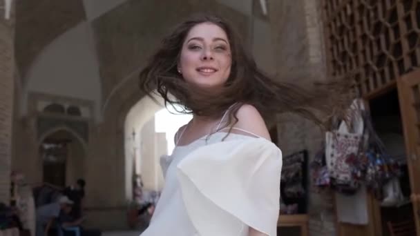 Young Woman Flowing Hair Light White Sundress Sandals Walks Ancient — Stock Video