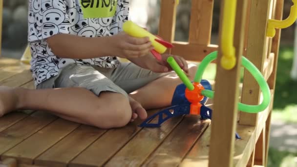 Teenager Sits Playground Launches Air Rocket Slow Motion — Stock Video