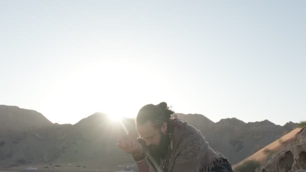 Man Staff His Hand Clothes Shaman Stands Rock Sands Desert — Stock Video