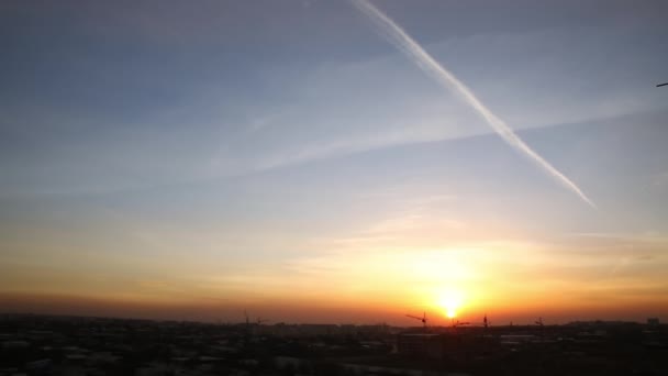 Sunset City Cloudy Evening Sky Trail Flying Plane Hills Horizon — Stock Video