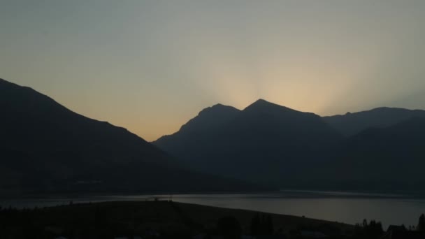 Sun Rises Mountains Calm Lake Windless Summer Morning — Stock Video