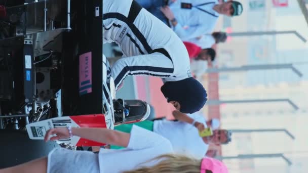 Dubai Uae 2024 Driver Racing Car Puts Helmet Protective Clothing — Stock Video