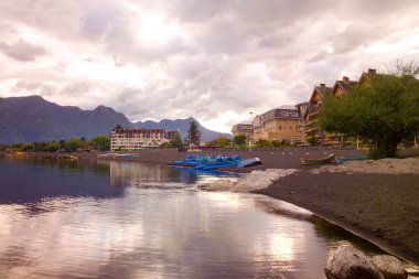 The shore of Lake Villariica in the city of Pucon, Chile clipart