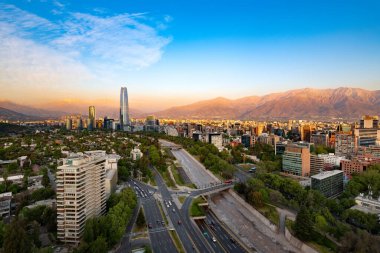 Panoramic view of Santiago de Chile with the Andes mountain range in the back clipart