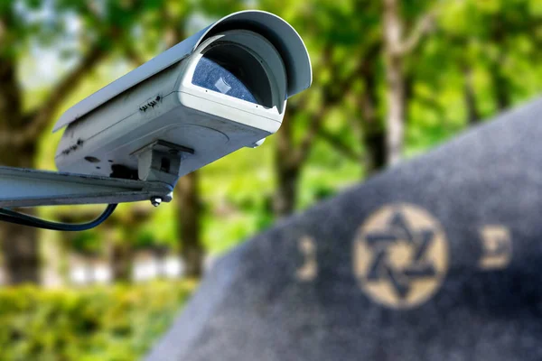 Überwachungskamera Mit Davidstern Hintergrund Konzept Zur Überwachung Religiöser Gebäude Jüdischen lizenzfreie Stockfotos