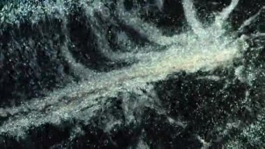 Yıldızlı Parıldayan Parçacıklar. Bokeh Parlak Parçacıklar Döngü Animasyonu. Siyah Arkaplan 'daki Yeşil Parçacıklar. Yüksek kalite 4k görüntü