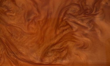 Beautiful smooth elegant wavy brown satin silk luxury cloth fabric texture, abstract background design.