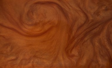 Beautiful smooth elegant wavy brown satin silk luxury cloth fabric texture, abstract background design.