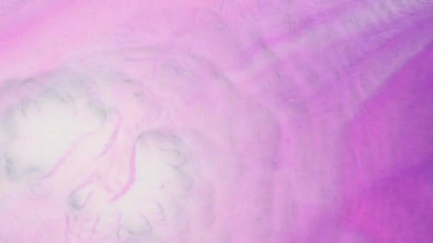 煙の質感 キラキラのインクが渦巻く 魔法の空気の波 暗い抽象的な背景にネオン輝く塵霧の流れ — ストック動画