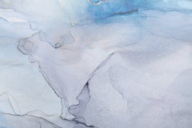 Mavi ve altın rengi alkol mürekkebi. Moda, mermer girdapları ya da agat dalgalarını içerir. Soyut resim, duvar kağıtları, posterler, kartlar, davetiyeler, web siteleri için moda arka plan.