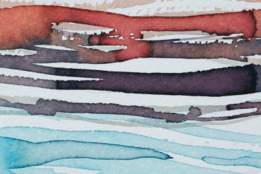 Renkli desenler dokuma kağıdındaki çeşitli mürekkep darbelerinden ortaya çıkar, kırmızı, mor, mavi ve beyaz renklerin bir karışımını sergiler..