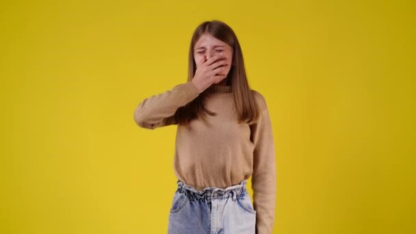 Slow Motion Video One Girl Yawning Streching Arms Yellow Background — Wideo stockowe
