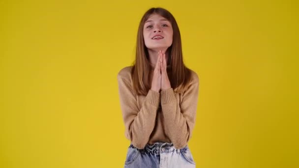 Slow Motion Video One Girl Begging Something Yellow Background Concept — Stockvideo