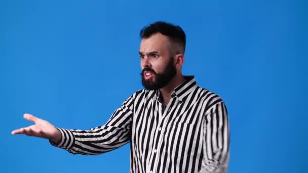Slow Motion Video Man Being Emotional Blue Background Concept Emotions — Vídeo de Stock