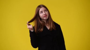 4k slow motion video of one girl touching her hair. Concept of emotions.