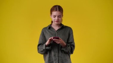4k slow motion video of one girl using phone and showing thumb up. Concept of emotions.