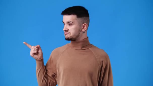 Slow Motion Video One Man Pointing Left Showing Thumb Blue — Vídeo de stock