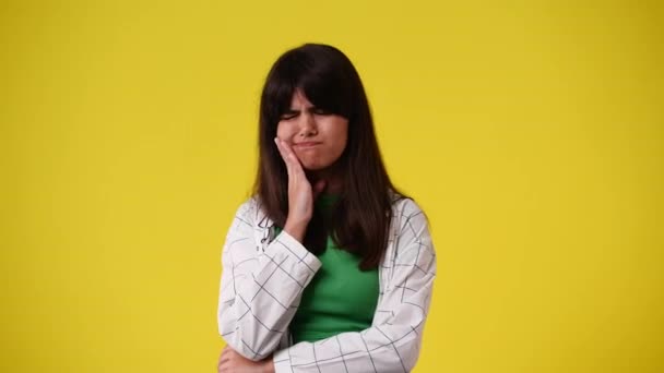 Slow Motion Video One Girl Having Toothache Yellow Background Concept — Video