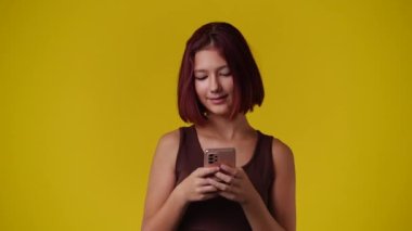 4k slow motion video of one girl sending message with positive facial expression. Concept of emotions.