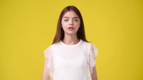 Slow Motion Video One Girl Feeling Excited Yellow Background Concept — Vídeo de Stock