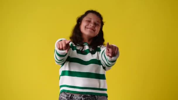 Video One Girl Pointing Camera Showing Thumbs Yellow Background Concept — Stockvideo