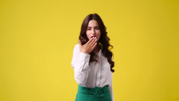 Slow Motion Video One Girl Sending Air Kiss Yellow Background — Stock Video