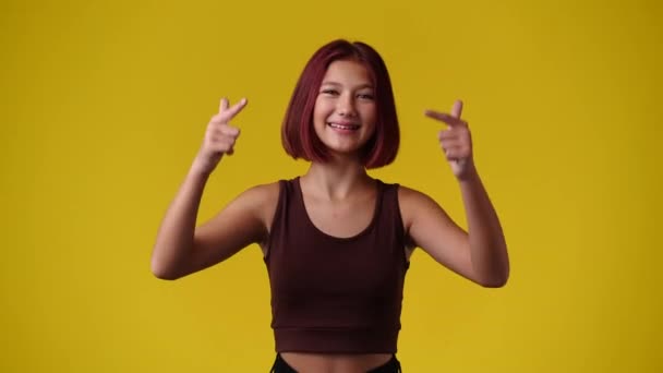 Slow Motion Video One Girl Pointing Camera Showing Thumbs Yellow — Vídeos de Stock