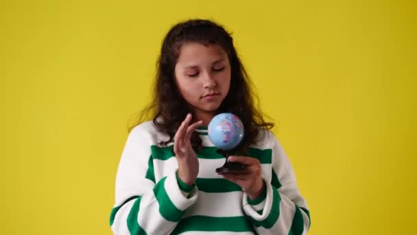 Video One Girl Looking Small Globe Concept Emotions — Vídeos de Stock