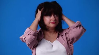 4k slow motion video of one woman doing head massage. Concept of emotions.