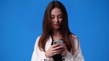 4k slow motion video of one girl sending message with positive facial expression. Concept of emotions.