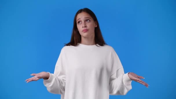 Slow Motion Video One Girl Gesturing Blue Background Concept Emotions — Video