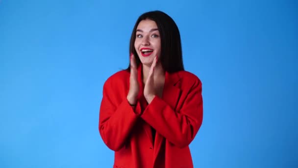 Video Excited Girl Clapping Hands Blue Background Concept Emotions — Vídeos de Stock
