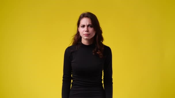 Slow Motion Video One Woman Emotionally Rejoices Yellow Background Concept — Vídeos de Stock