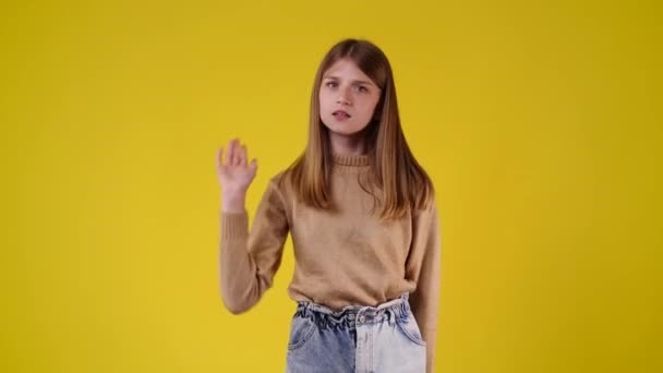 Video One Girl Showing Stop Sign Yellow Background Concept Emotions — Vídeo de stock