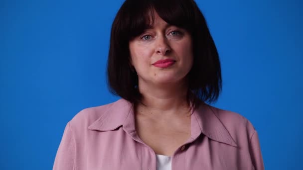 Slow Motion Video One Woman Positive Emotions Blue Background Concept — Vídeos de Stock