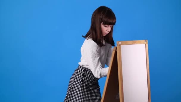Video One Young Girl Drawing Chalk Board Blue Background Concept — Wideo stockowe