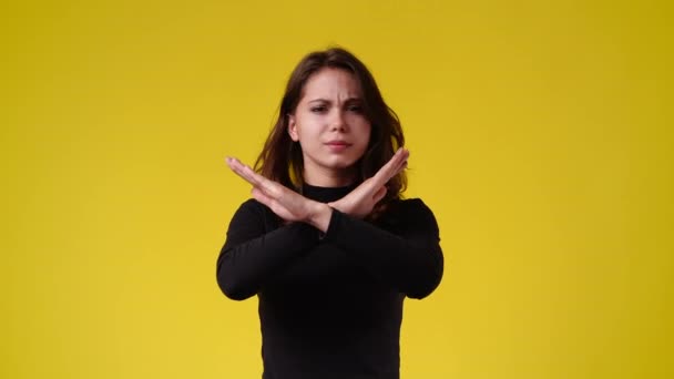 Video One Girl Showing Stop Sign Yellow Background Concept Emotions — Video