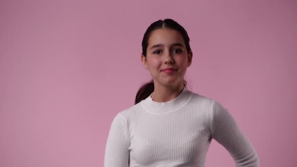 Slow Motion Video One Girl Showing Thumbs Smiling Pink Background — Vídeo de stock