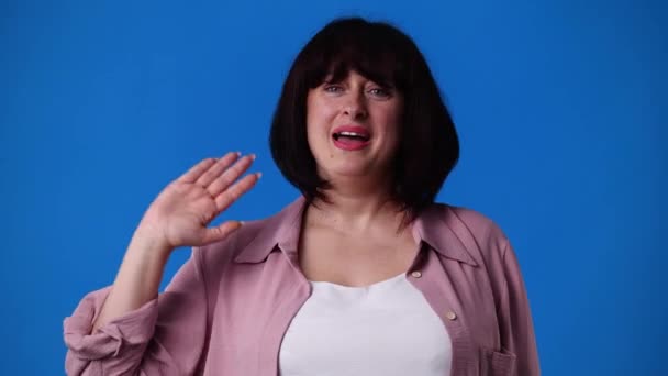 Slow Motion Video One Woman Positive Emotions Blue Background Concept — Stock videók