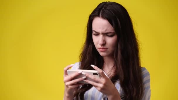 Video One Girl Sending Messages Yellow Background Concept Emotions — Stockvideo