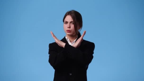 Video One Girl Crossed Hands Blue Background Concept Negative Emotion — Stock Video