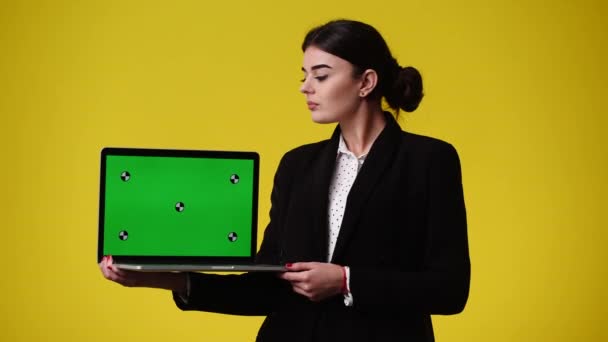 Video One Girl Who Holding Laptop Showing Thumb Yellow Background — Stock Video