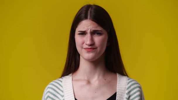 Video One Girl Negative Facial Expression Yellow Background Concept Emotions — Vídeos de Stock