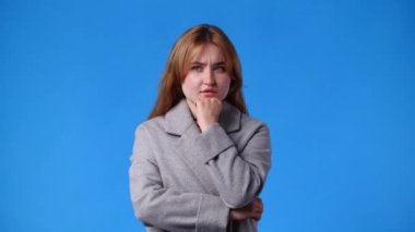 4k video of one girl thinking about something and showing thumb up. Concept of emotions.