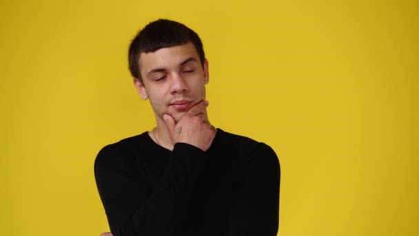 Video Man Thinking Something Yellow Background Concept Emotions — Stockvideo