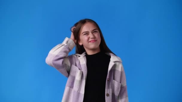 Video One Girl Negative Facial Expression Blue Background Concept Emotions — Vídeo de Stock