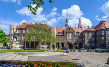 Szeged, Hungary. University of Dentistry named after Albert Szent-Gyorgyi next to Dom square and Votive Church